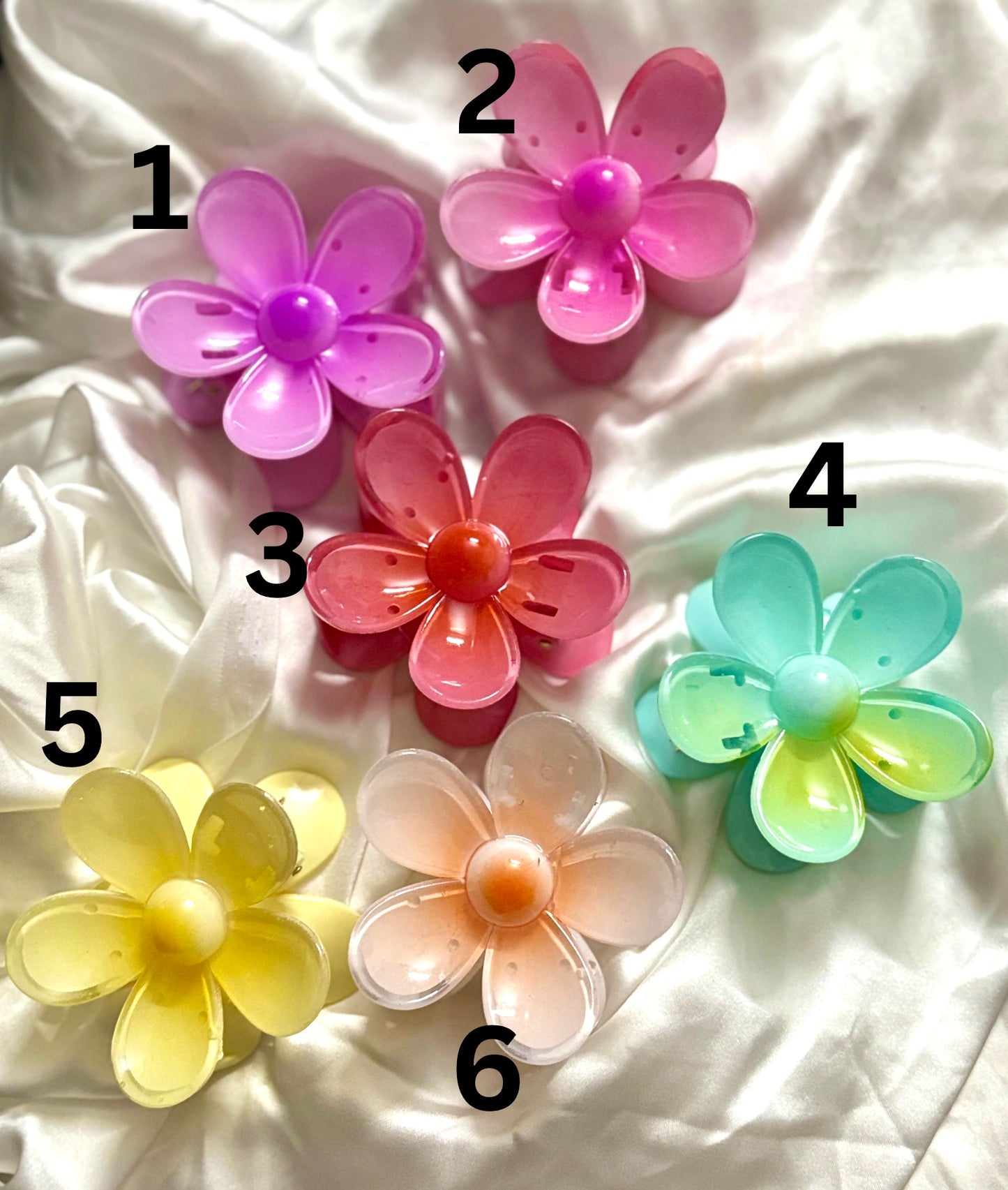 Most viral jelly flower claw clips in 6 vibrant glossy colors – trending transparent floral hair accessories for girls and women, perfect for stylish summer looks.