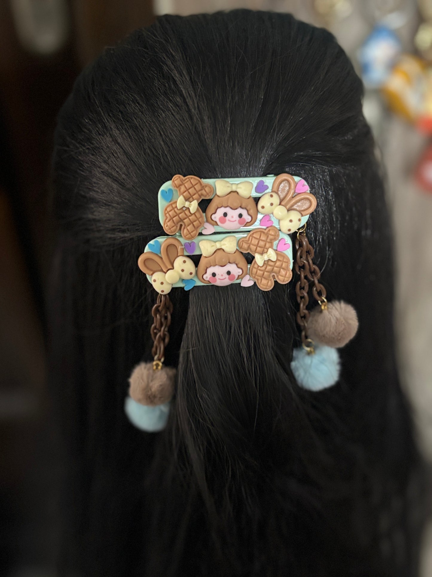 Cute pastel clips with chocolate girl designs, bunny cookies, and fluffy Pom Poms. Adds a sweet, fun vibe to any hairstyle—perfect for kids and teens.