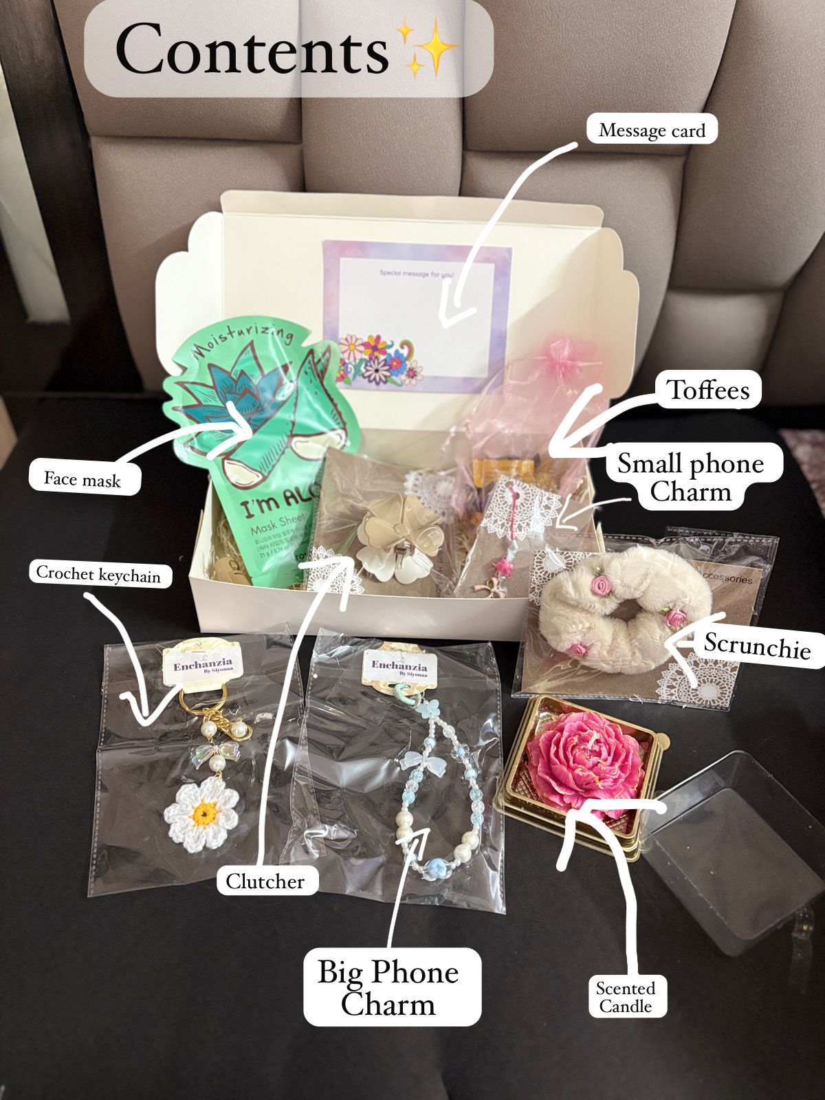 A curated gift hamper featuring fairy lights, a face mask, scented candle, scrunchie, big and small phone charms, crochet keychain, clutcher, toffees, and a message card — perfect for gifting and self-care.