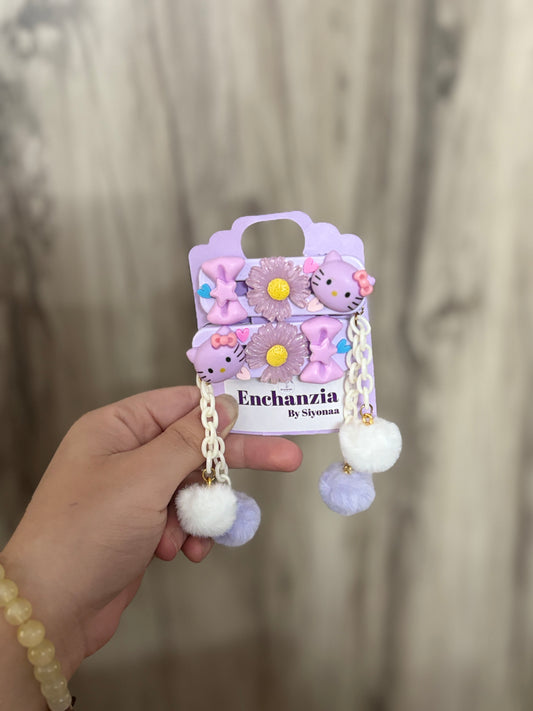 Cute pastel hair clips featuring Hello Kitty, floral accents, stars, hearts, and dangling Pom Poms. A kawaii accessory set perfect for girls and young teens.