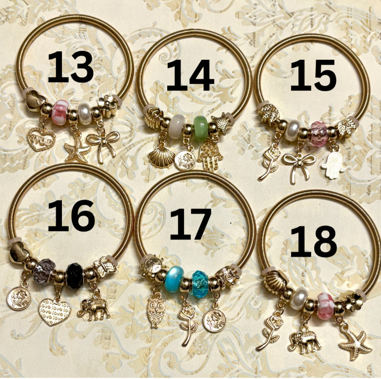 Stylish gold Pandora-inspired charm bracelets with hearts, butterflies, and trees. Elegant adjustable bangles perfect for gifting or everyday use. 