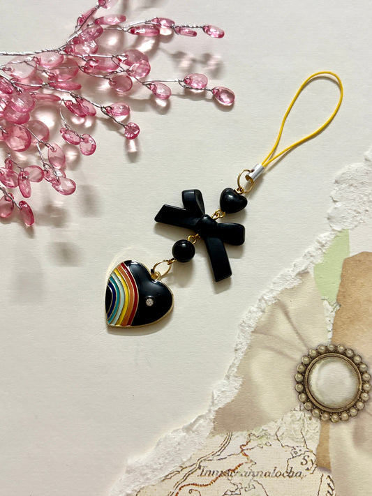 Rainbow pride heart phone charm with cross, heart, and round beads — a colorful and meaningful accessory available in four unique variations.